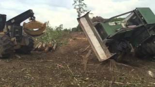 Skidder rolls over on hill side [upl. by Nawor250]