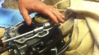 Piston ring insertion using hose clamp and plastic [upl. by Hearn]