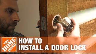 How to Install a Door Lock  The Home Depot [upl. by Gerek]