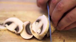 Knife Skills How To Slice Mushrooms [upl. by Aelgna]