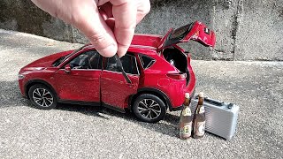 Unboxing of Mazda New CX5 118 diecast model car [upl. by Boorman]