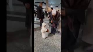 Beautiful scene cute girl distributing sweets in Masjid Al Haram  iqbal khan 121 [upl. by Eboj]