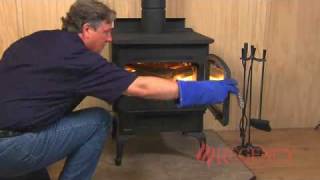 How to Light amp Maintain a Wood Stove Fire [upl. by Sacram]