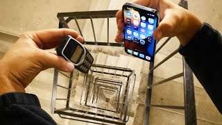 Dropping an iPhone 13 Pro vs Nokia 3310 Down Spiral Staircase 20 Stories  Will it Survive [upl. by Yoshi782]