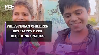 Palestinian children get happy after receiving snacks [upl. by Larcher]