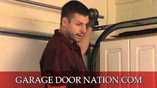 How to Fix A Crooked Garage Door [upl. by Adnowat236]