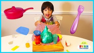 Ryan plays Crazy Cafe Board Game for kids with Egg Surprise Eggs [upl. by Eidroj379]