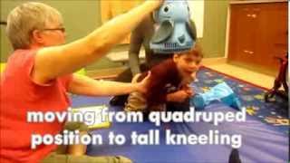 Moving from quadruped to tall kneeling position  Hold on Tight  Pediatric PT for CP [upl. by Gwenn94]