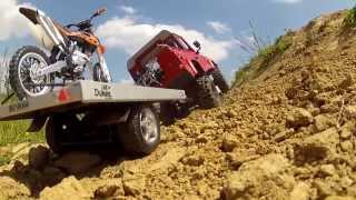 Crawling hard with an Axial Defender D90 Pickup with motorbike trailer [upl. by Schoenburg]