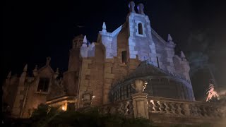 The Haunted Mansion Full Ride in 4k at Disneys Magic Kingdom 2024 Night Time Queue [upl. by Ednyl]