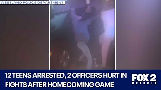 12 high school students arrested for attacking police after homecoming game in Westland [upl. by Irahc]