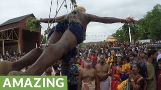 Huge festival features show of devotion that few could endure [upl. by Knut]