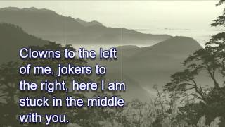 Stealers Wheel  Stuck In The Middle With You LYRICS [upl. by Bard]