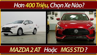 Hơn 400 triệu chọn Mazda 2 hay MG5 Chi tiết lăn bánh và trả góp xe MG5 STD và Mazda 2 AT [upl. by Ahsiela]