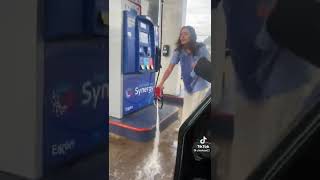 Girl sprays gas on herself at gas station PLEASE SUBSCRIBE gas gasstation gasoline accident [upl. by Kettie]