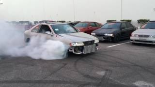 TWISTED MOTION SR20DET B14 200SX SER GTIR BURNOUT WITH S13 240SX 1JZ [upl. by Farra]