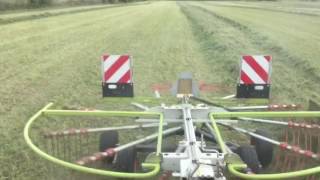 Racking some hay with my 2014 John Deere 6125m and claas liner 450 [upl. by Animrelliug]