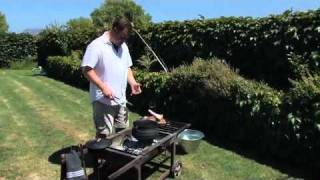 How to Braai Making a Potjie Slow Cooking [upl. by Llertac421]