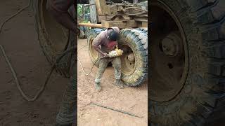 How to use an impact machine in a logging truck trailer tyre logging [upl. by Oirretno]