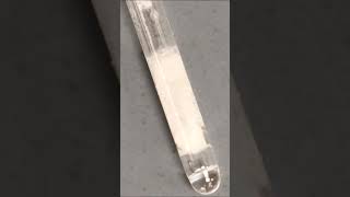 Acetanilide crystallizing in a melting point capillary tube chemistry crystal stem macrovideo [upl. by Anerat966]