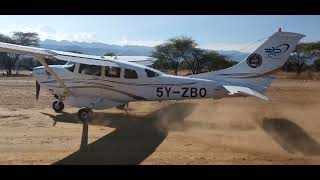 Small plane takes off from a dirt runway in Kenya [upl. by Caia]