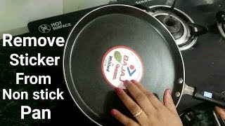 How to remove sticker from non stick pan  नान स्टिक पैन से स्टीकर हटाने का आसान तरीका [upl. by Sisto599]