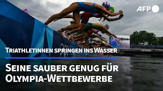 Seine in Paris sauber genug OlympiaTriathletinnen springen ins Wasser  AFP [upl. by Atteiluj]