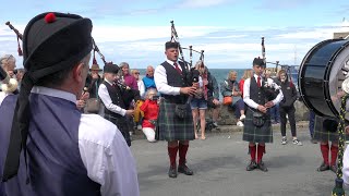 Portsoy Pipe Band playing Bonnie Galloway set by on harbour during 2023 Portsoy Boat Festival [upl. by Thekla800]