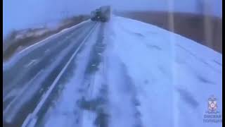 Two trucks collide on an icy road [upl. by Bevvy494]