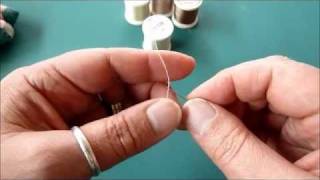 Hand Appliqué How to Make a Silk Thread Knot [upl. by Neiviv]