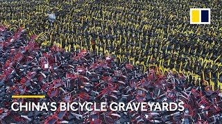 Drone footage shows thousands of bicycles abandoned in China as bike sharing reaches saturation [upl. by Spiros68]