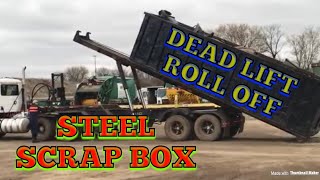 Loading a box of scrap steel onto a semi using a dead lift roll off truck [upl. by Angeline304]