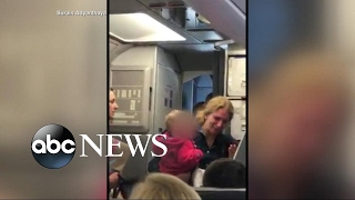 More details on American Airlines flight attendants confrontation with passengers [upl. by Varion]