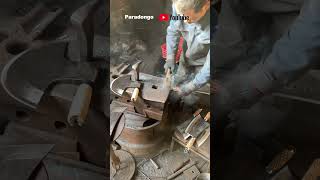 A blacksmith is making a handle for a machete [upl. by Neal411]