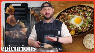 How A Filipino Chef Makes Traditional Pork Sisig  Passport Kitchen  Epicurious [upl. by Kris816]