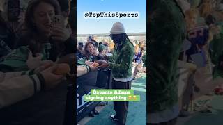 Davante Adams Takes Money from a Fan 😂💵🏈 Wild NFL Moment [upl. by Niliak]