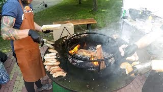 Pork and Chicken Sausages on a Circular Grill Minsk Street Food Belarus [upl. by Pozzy]