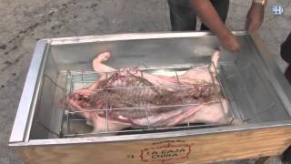 How to roast a whole pig in a Caja China [upl. by Riggins]