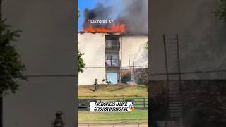 Firefighters ladder falls onto power lines during apartment fire in Lexington [upl. by Laitselec]