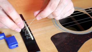 How to Change an Acoustic Guitar String EASY [upl. by Notsecnirp]