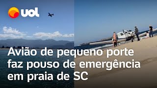 Avião de pequeno porte faz pouso de emergência em areia da praia em SC veja vídeo [upl. by Mikkel]