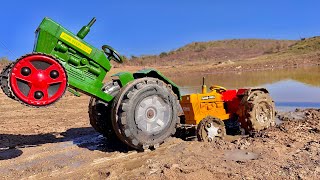 John Deere 5405 4WD Tractor Pulling Stucked HMT 5911 due to fully mud rolling 🛞 tyre MahindraDi575 [upl. by Gunner]