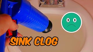 How to clean a clogged drain Let’s Fix It Fast [upl. by Anelej]