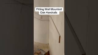 Fitting wall mounted oak handrails construction site tools [upl. by Gaw]