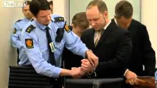 Anders Breivik salutes as he arrives in court [upl. by Ynohtona]