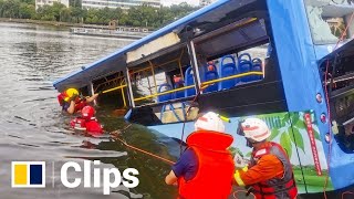 Bus crashes into reservoir killing at least 21 people in southern China [upl. by Euqinue73]