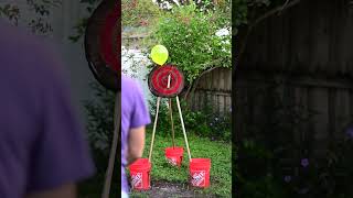 Axe Throwing Balloon Popping Slow Motion [upl. by Boeke267]