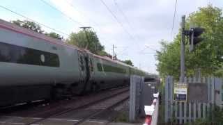 Pendolino full speed at 125Mph Through Level Crossing [upl. by Leuneb]