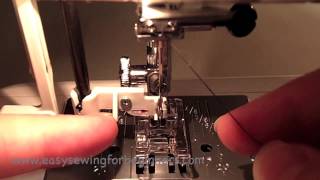 How to use the Automatic Needle Threader on a Sewing Machine [upl. by Yrrat965]