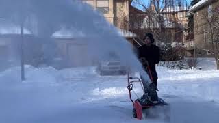 Driveway Snow Blowing in NW Calgary by LLawns [upl. by Ehman]